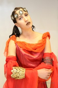 Dress designer Linda Blissett. Headwear and Accessory designer Marianna Harutunian US fashion source. Model Danubia Sousa.