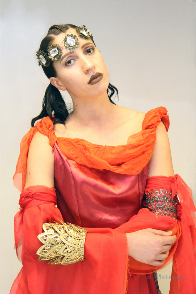 Dress designer Linda Blissett. Headwear and Accessory designer Marianna Harutunian US fashion source. Model Danubia Sousa.